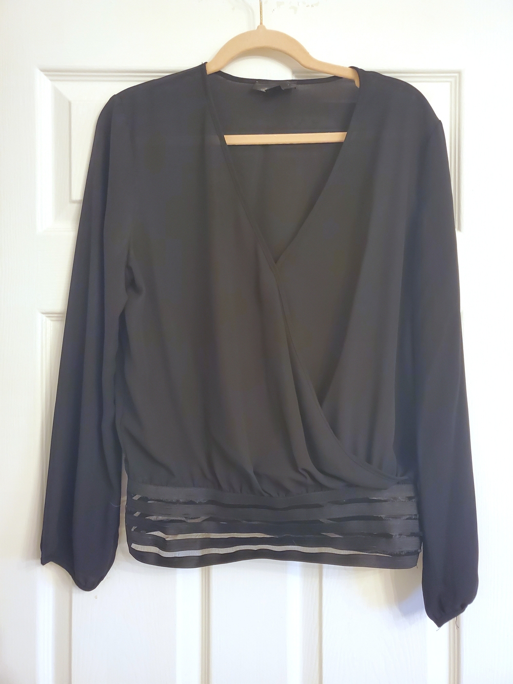 Black Long-Sleeve Surplice Blouse with Sheer Hem